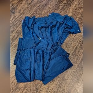 Lot of women's healing hands navy blue scrubs size medium.